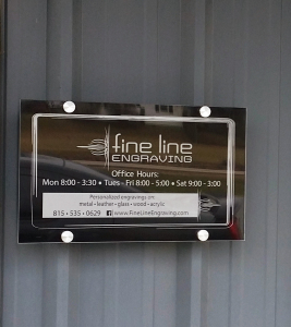 Fine Line Outdoor sign on building